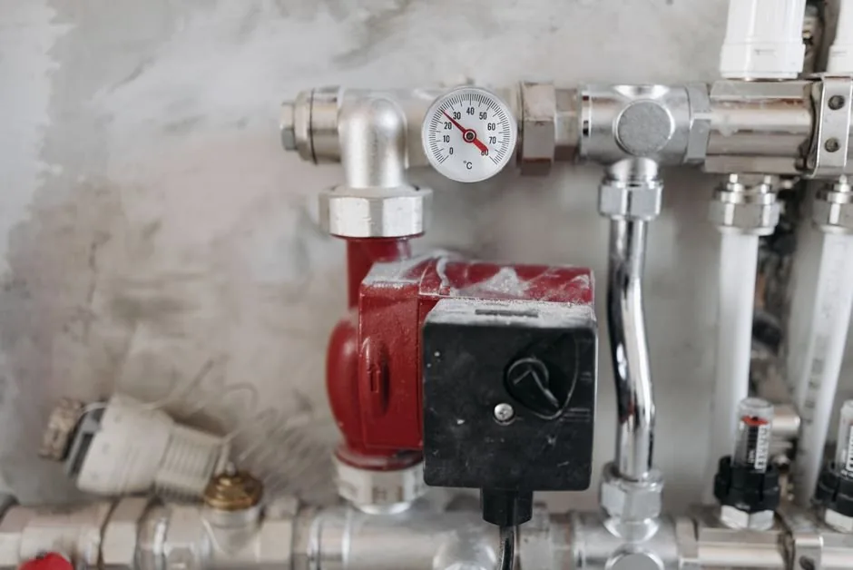 Industrial plumbing with pressure gauge